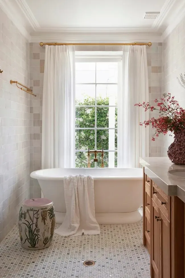 Remodeled bathroom with mosaic tile floor and fully tiled walls by Tile with Style, Greenville SC