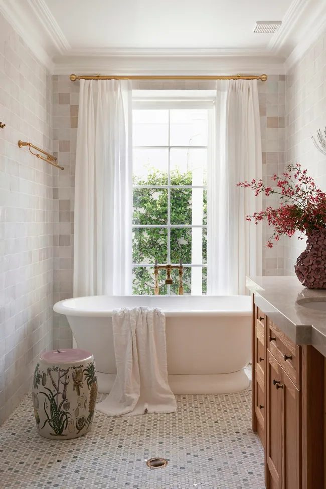 Remodeled bathroom with mosaic tile floor and fully tiled walls by Tile with Style, Greenville SC