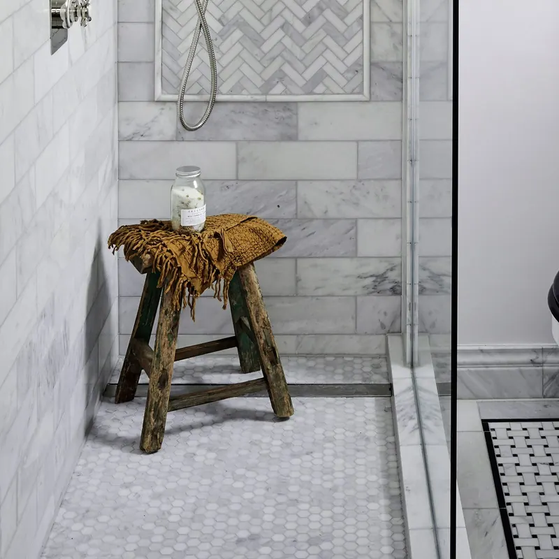 Hexagon mosaic shower floor tile repaired and regrouted by Tile with Style in Greenville, SC