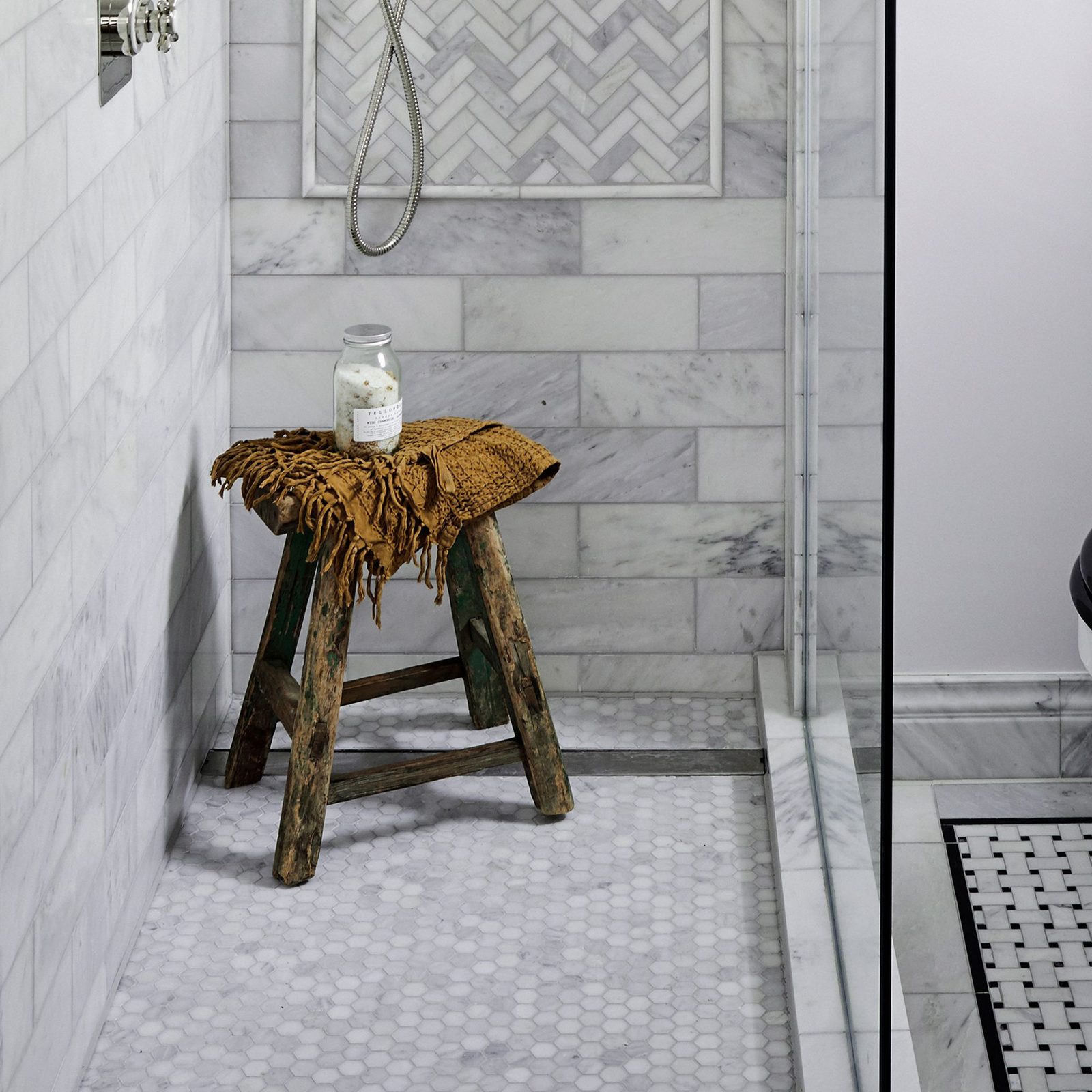 Hexagon mosaic shower floor tile repaired and regrouted by Tile with Style in Greenville, SC